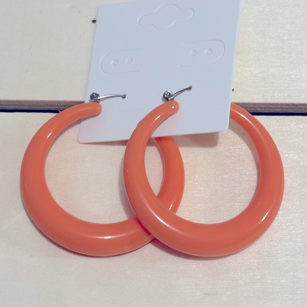 Light coral colored acrylic hoops!  Beautiful!
